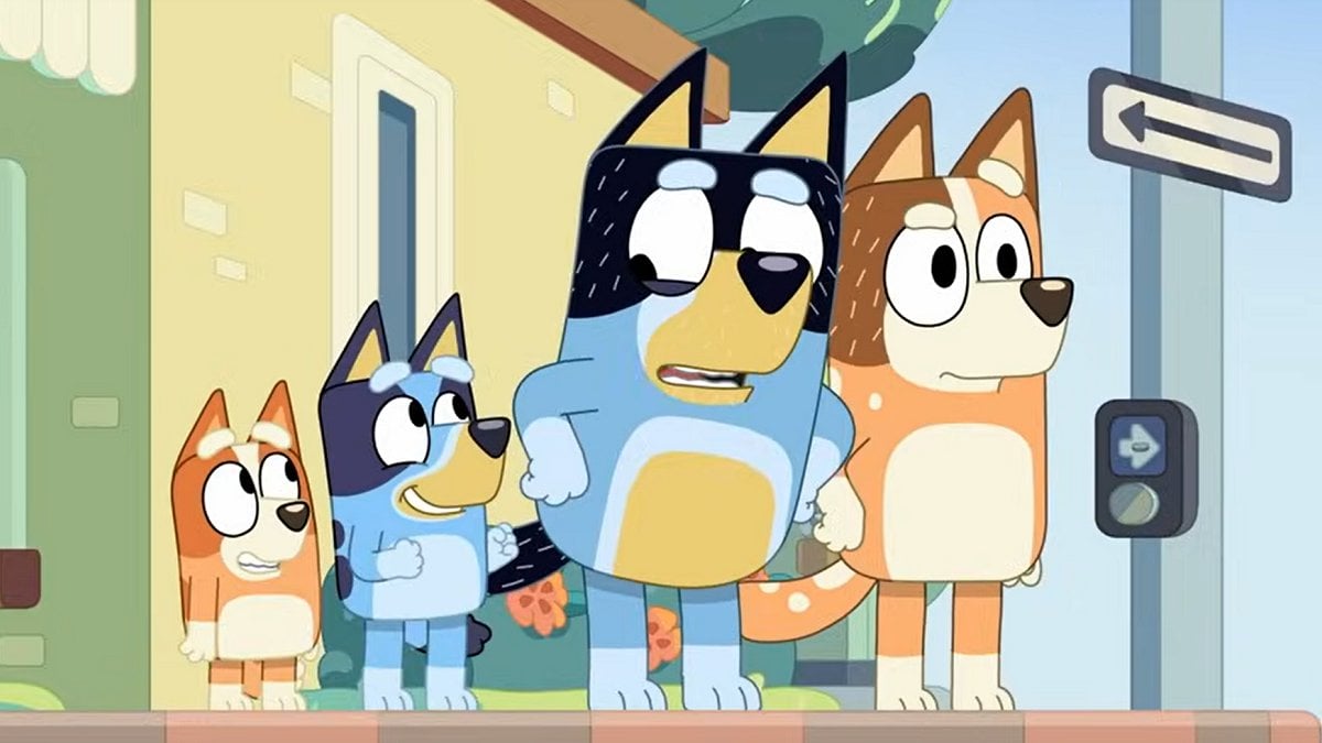 Bandit looking annoyed at Bingo and Bluey
